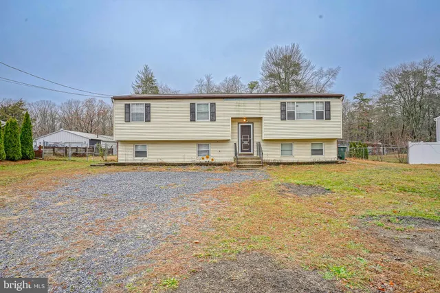 a house view with a outdoor space