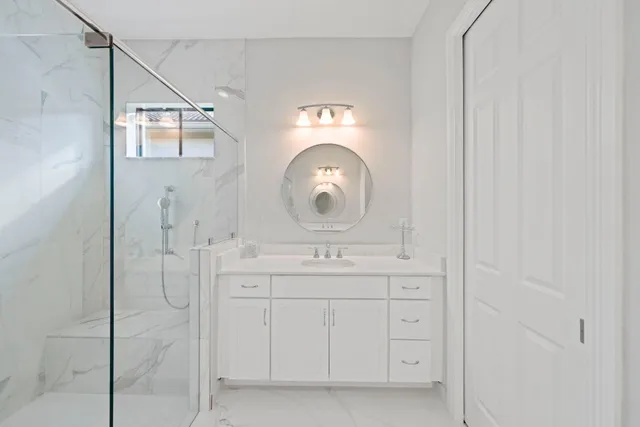 a white sink sitting next to a white sink