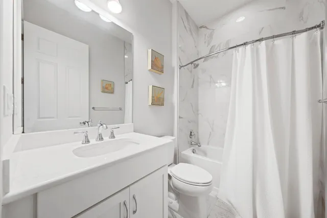 a view of a lake with a yard