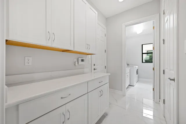 a view of a house with backyard and porch