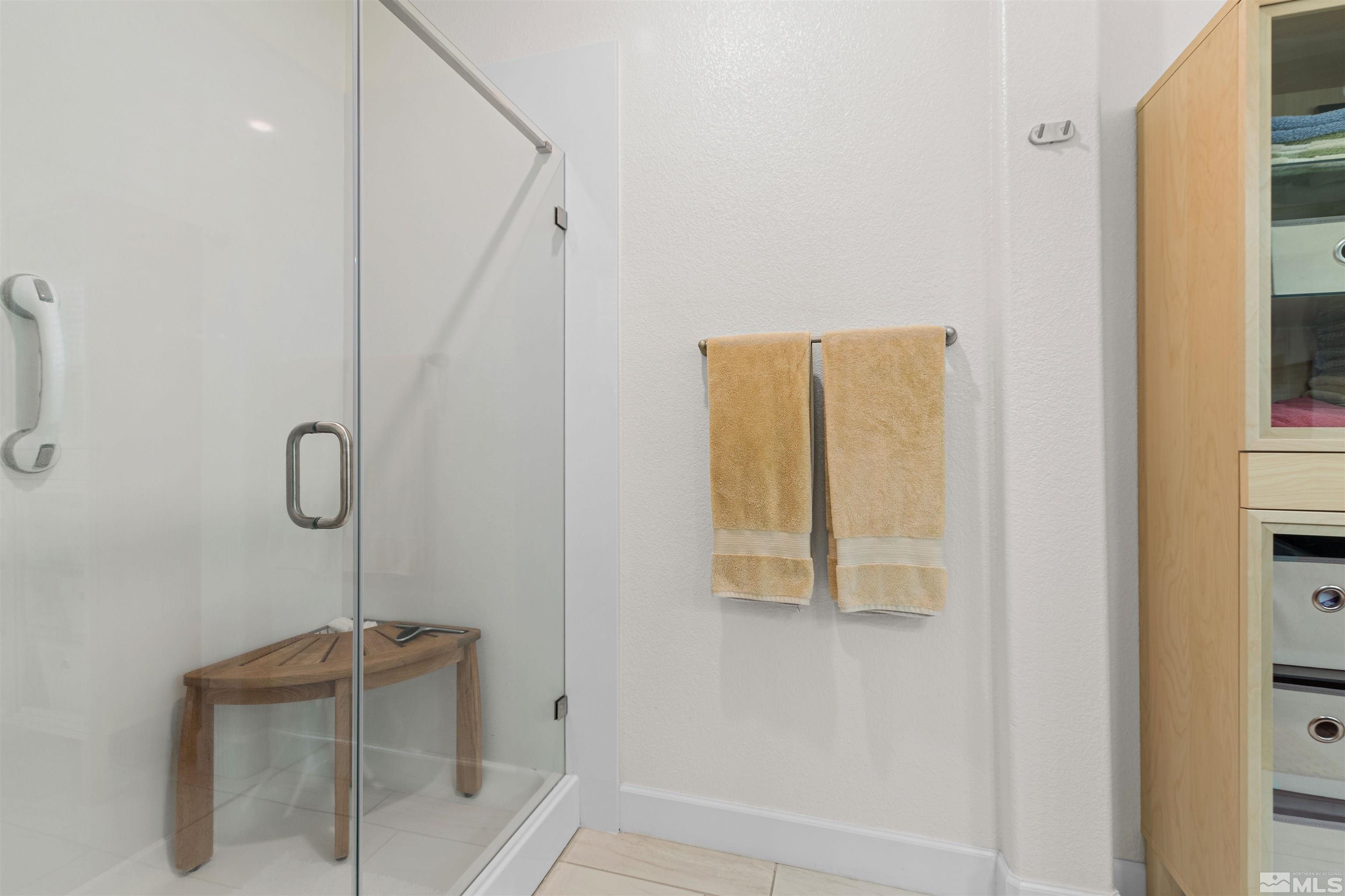 1876 Scott Valley Road Reno, NV 89523 - Photo 17 of 31 a bathroom with a shower