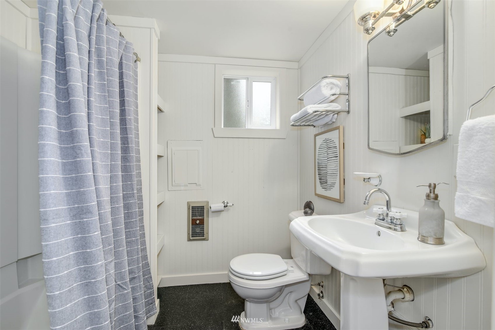 7327 Lake Alice Road Southeast Fall City, WA 98024 - Photo 11 of 35 a bathroom with a sink toilet and mirror
