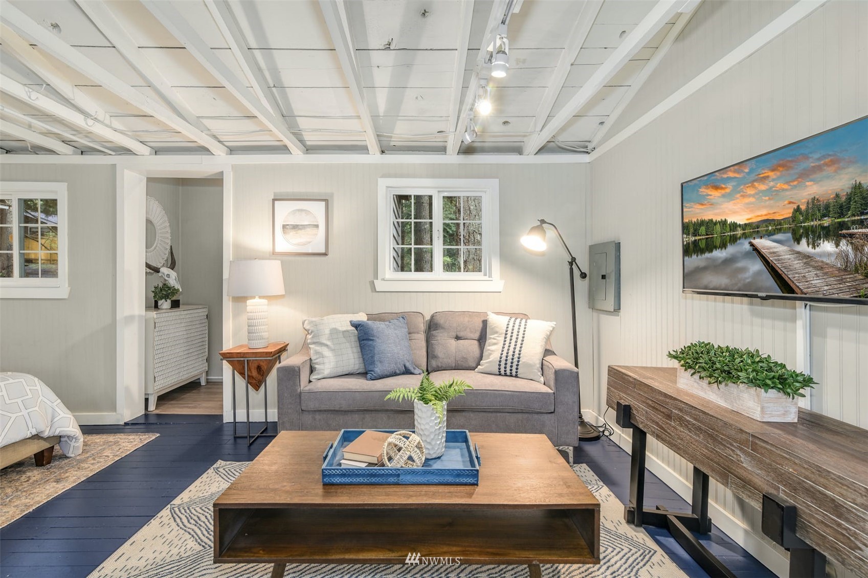 7327 Lake Alice Road Southeast Fall City, WA 98024 - Photo 23 of 35 a living room with furniture and a large window