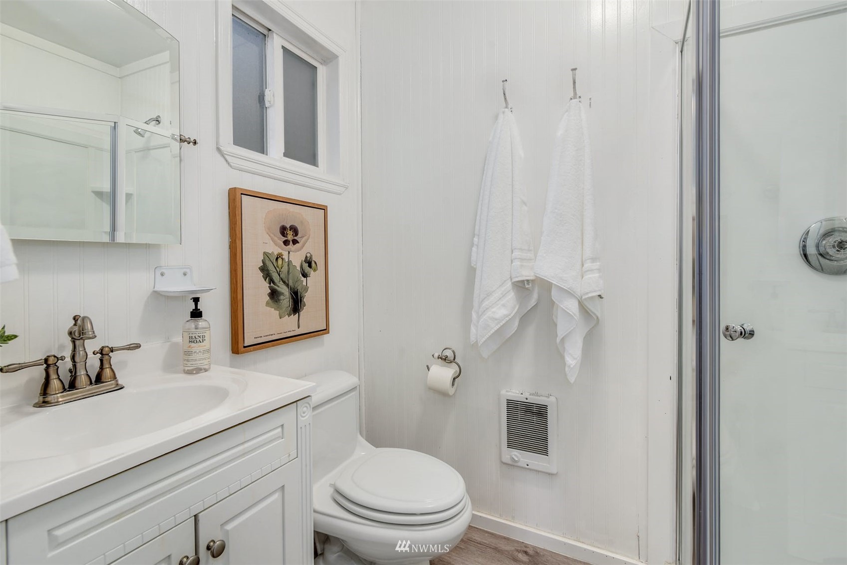 7327 Lake Alice Road Southeast Fall City, WA 98024 - Photo 25 of 35 a bathroom with a toilet sink and vanity