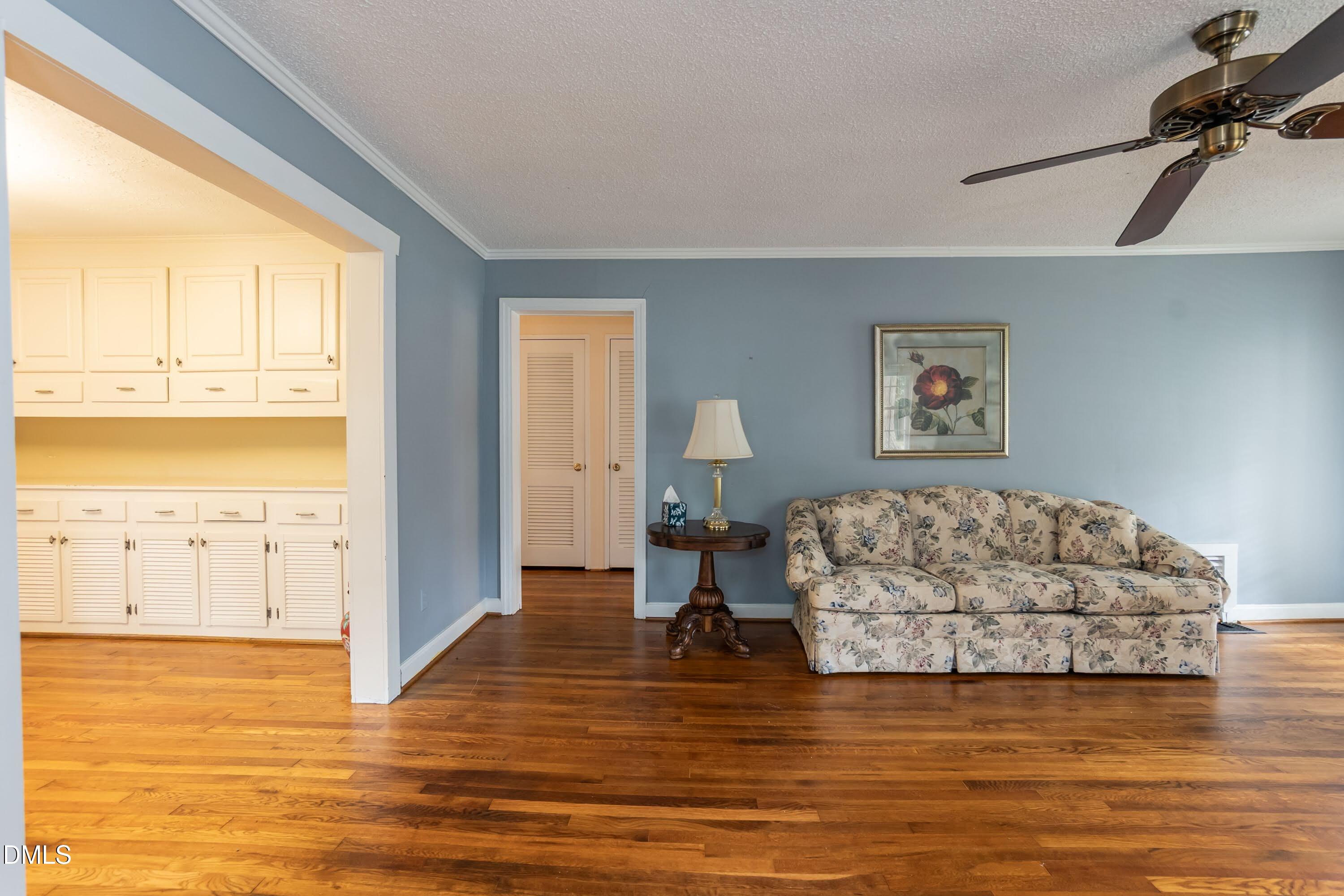 700 St Marys Street Garner, NC 27529 - Photo 10 of 51 a living room with furniture and a large window
