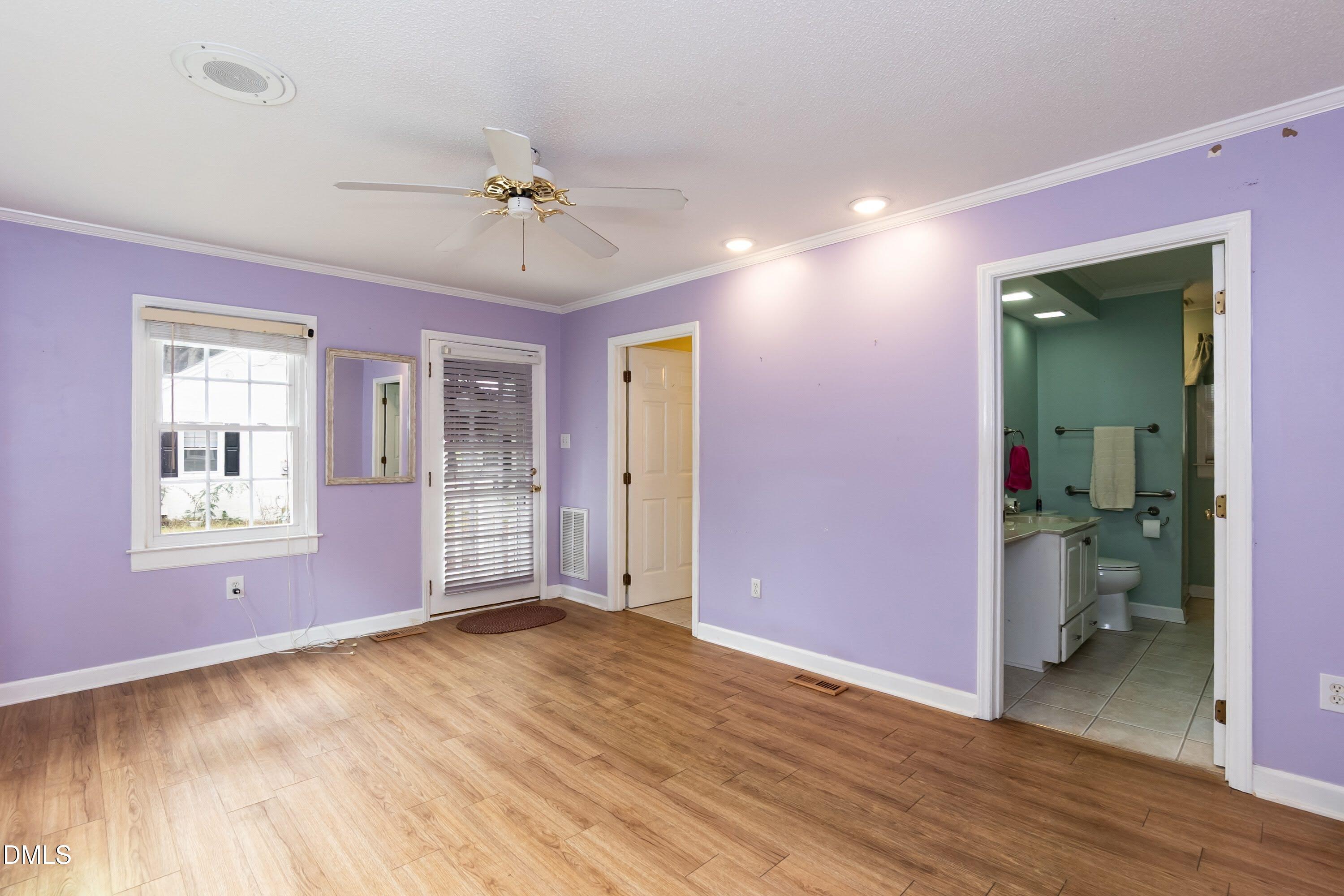 700 St Marys Street Garner, NC 27529 - Photo 23 of 51 wooden floor and windows in an empty room