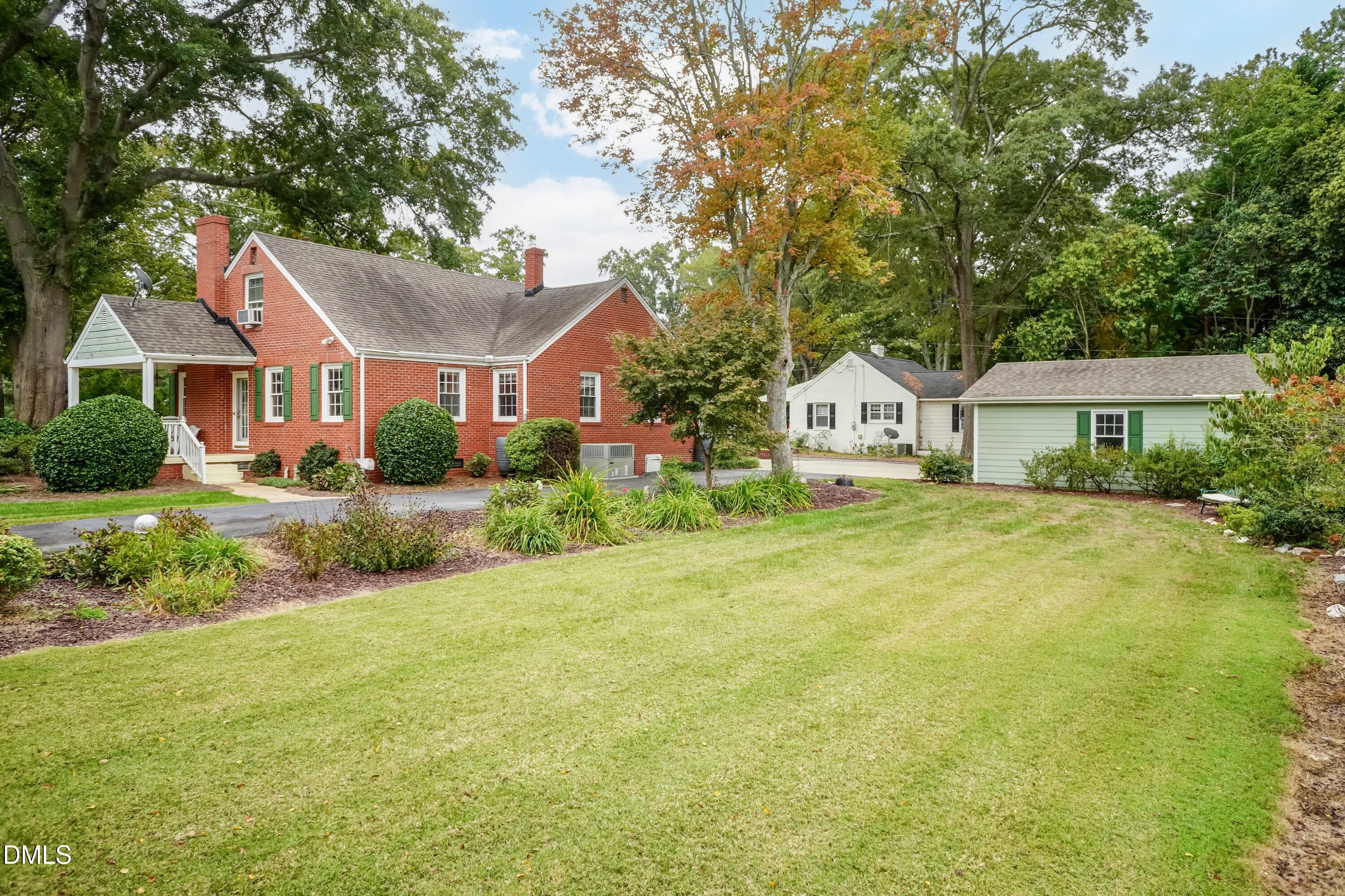 700 St Marys Street Garner, NC 27529 - Photo 35 of 51 a front view of a house with garden