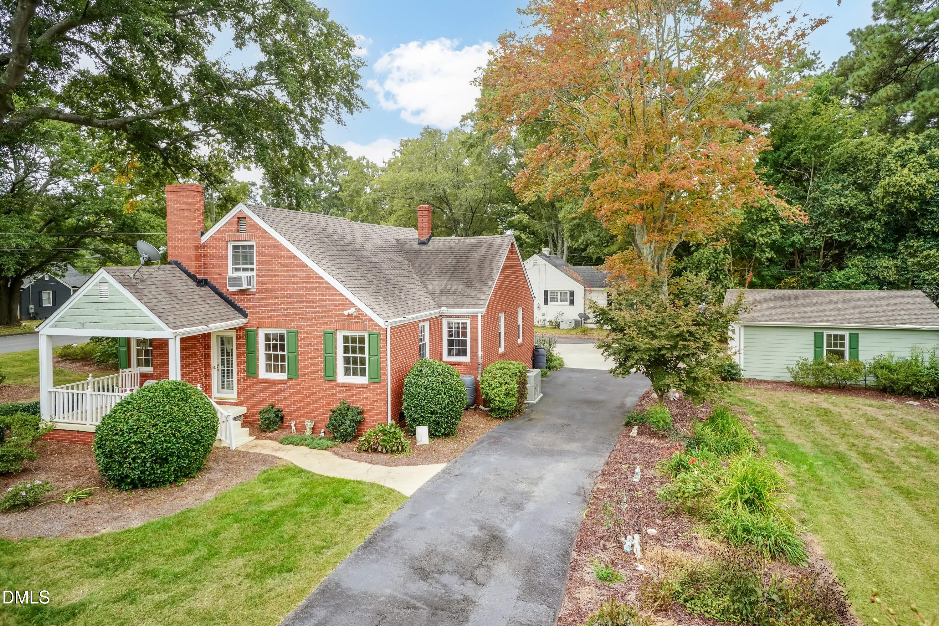 700 St Marys Street Garner, NC 27529 - Photo 37 of 51 a front view of a house with a yard and trees