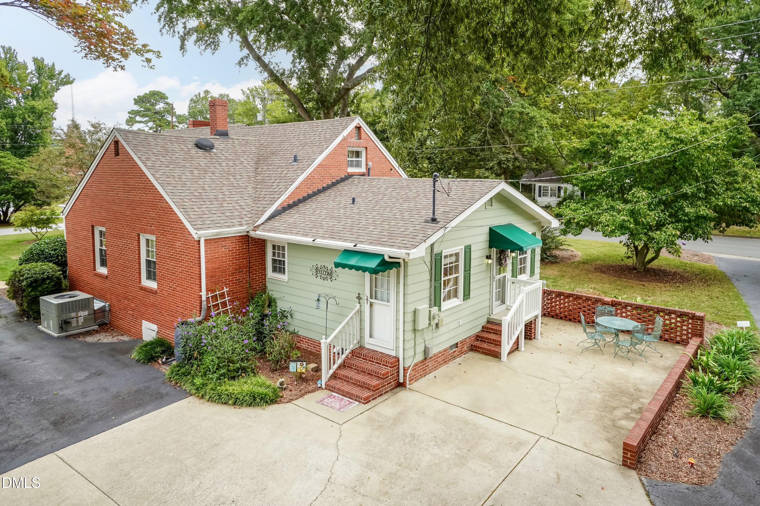 700 St Marys Street Garner, NC 27529 - Photo 38 of 51 an aerial view of a house with a yard