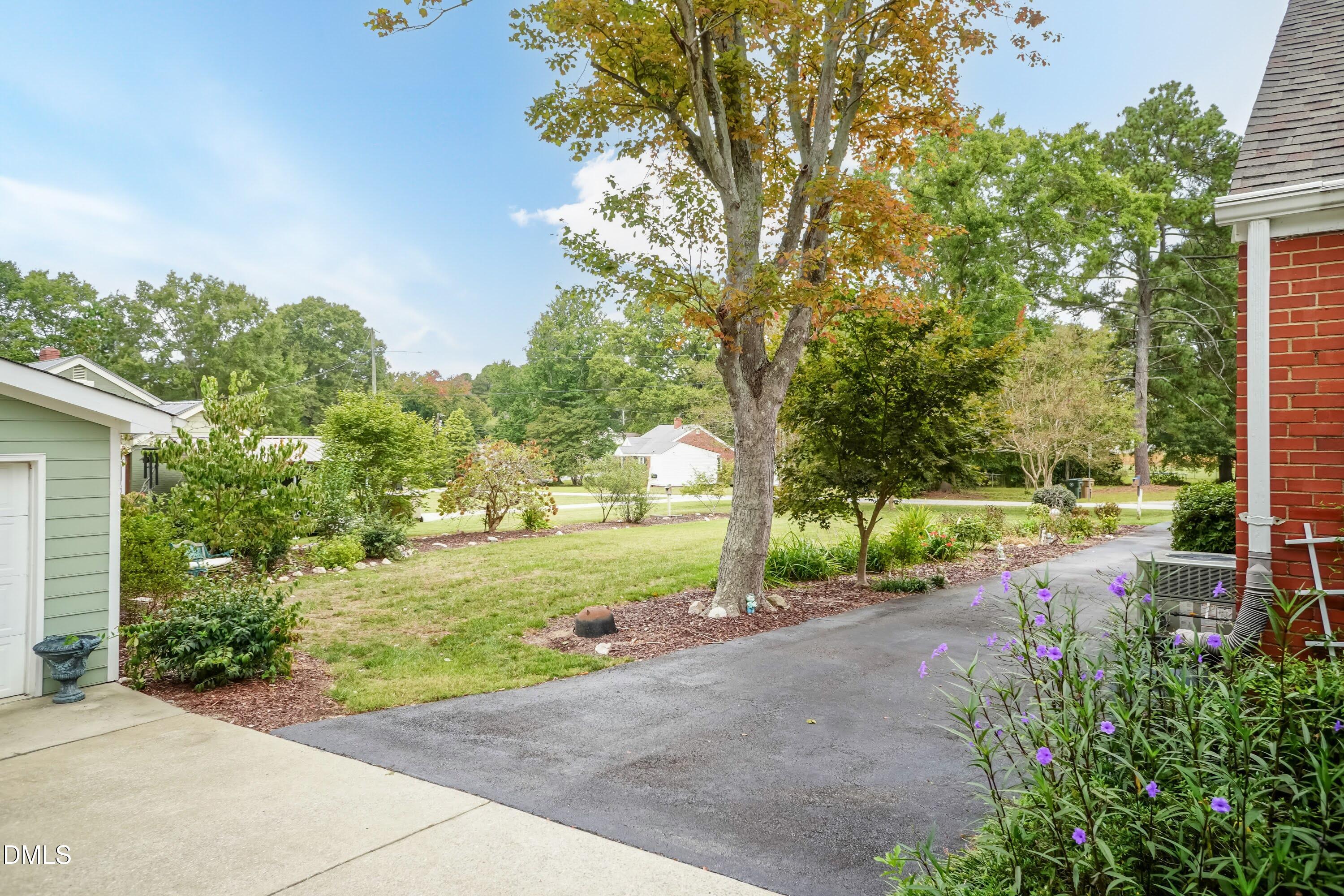 700 St Marys Street Garner, NC 27529 - Photo 39 of 51 a view of a backyard with garden