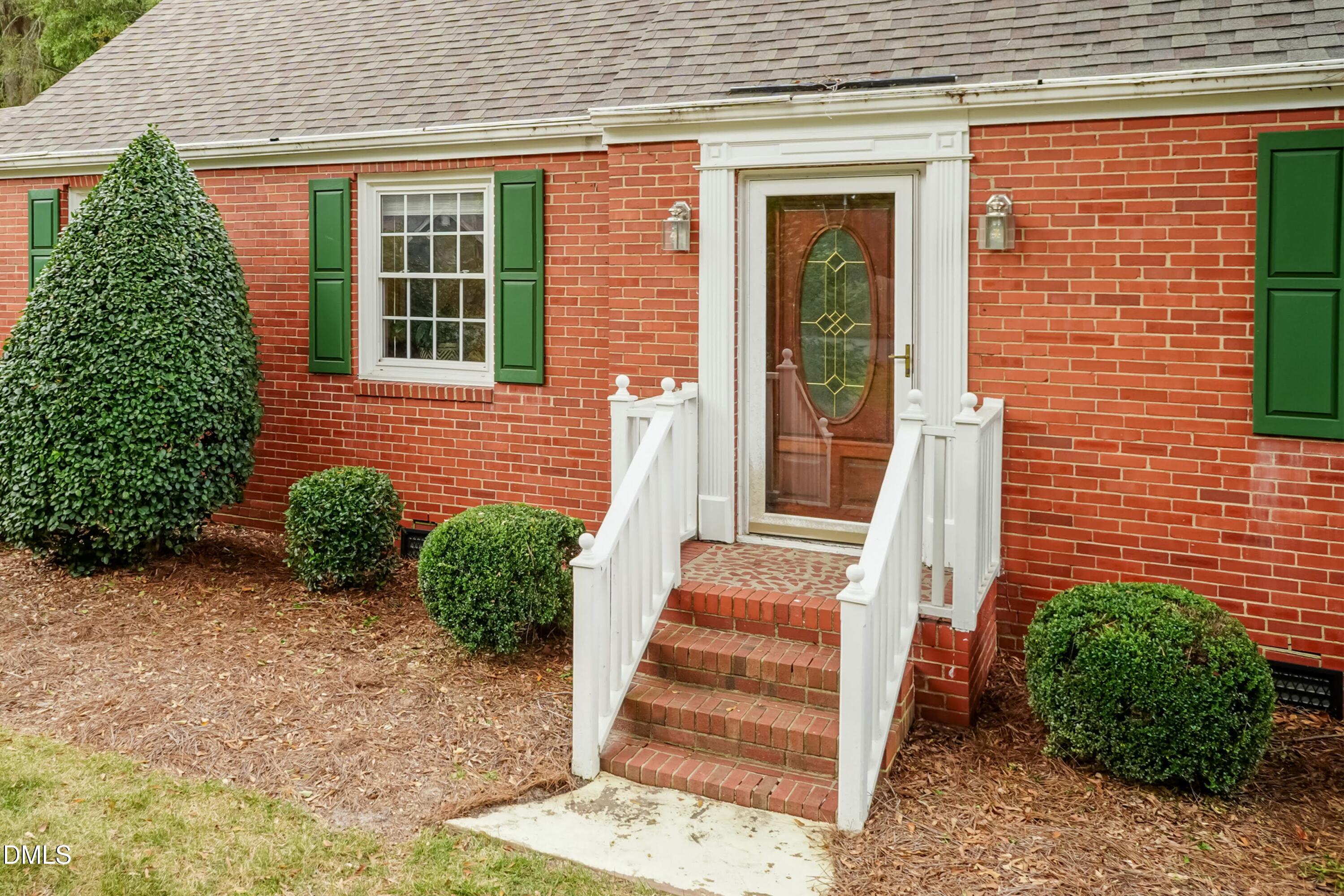 700 St Marys Street Garner, NC 27529 - Photo 6 of 51 a front view of a house with a yard