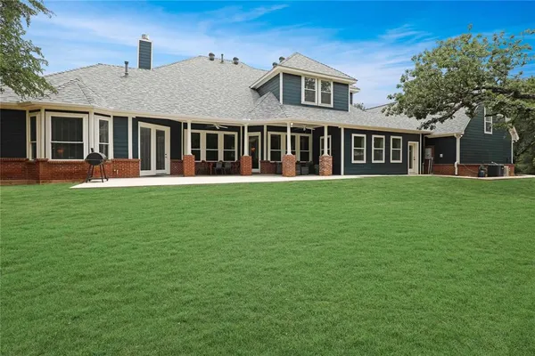 front view of a house with a garden