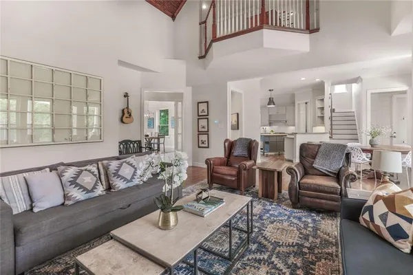 a living room with furniture or couch and a table