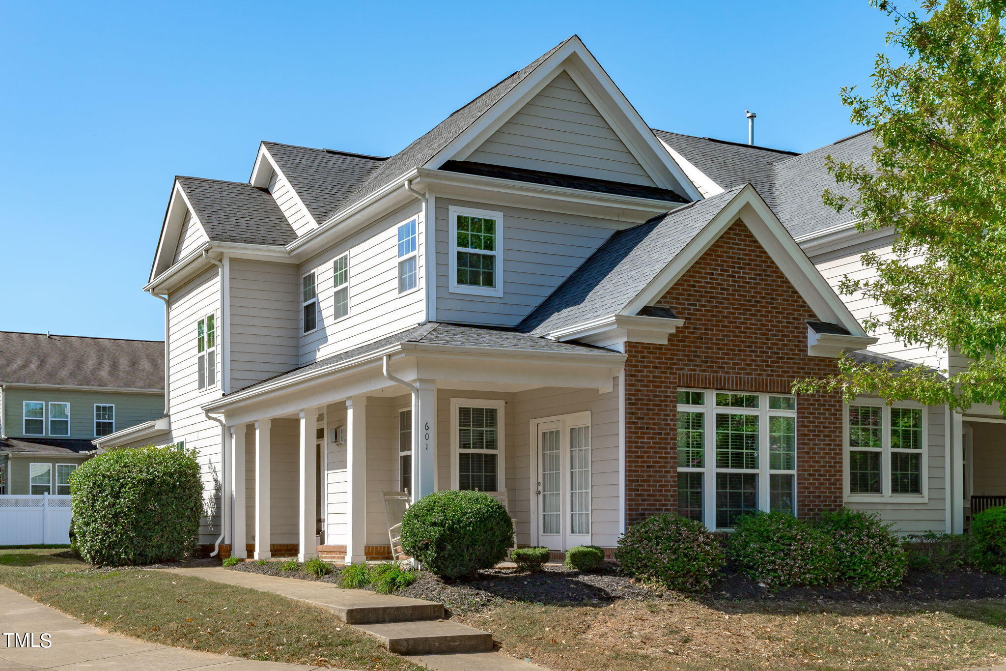 601 Democracy Street Raleigh, NC 27603 - Photo 1 of 24 front view of a house and a yard
