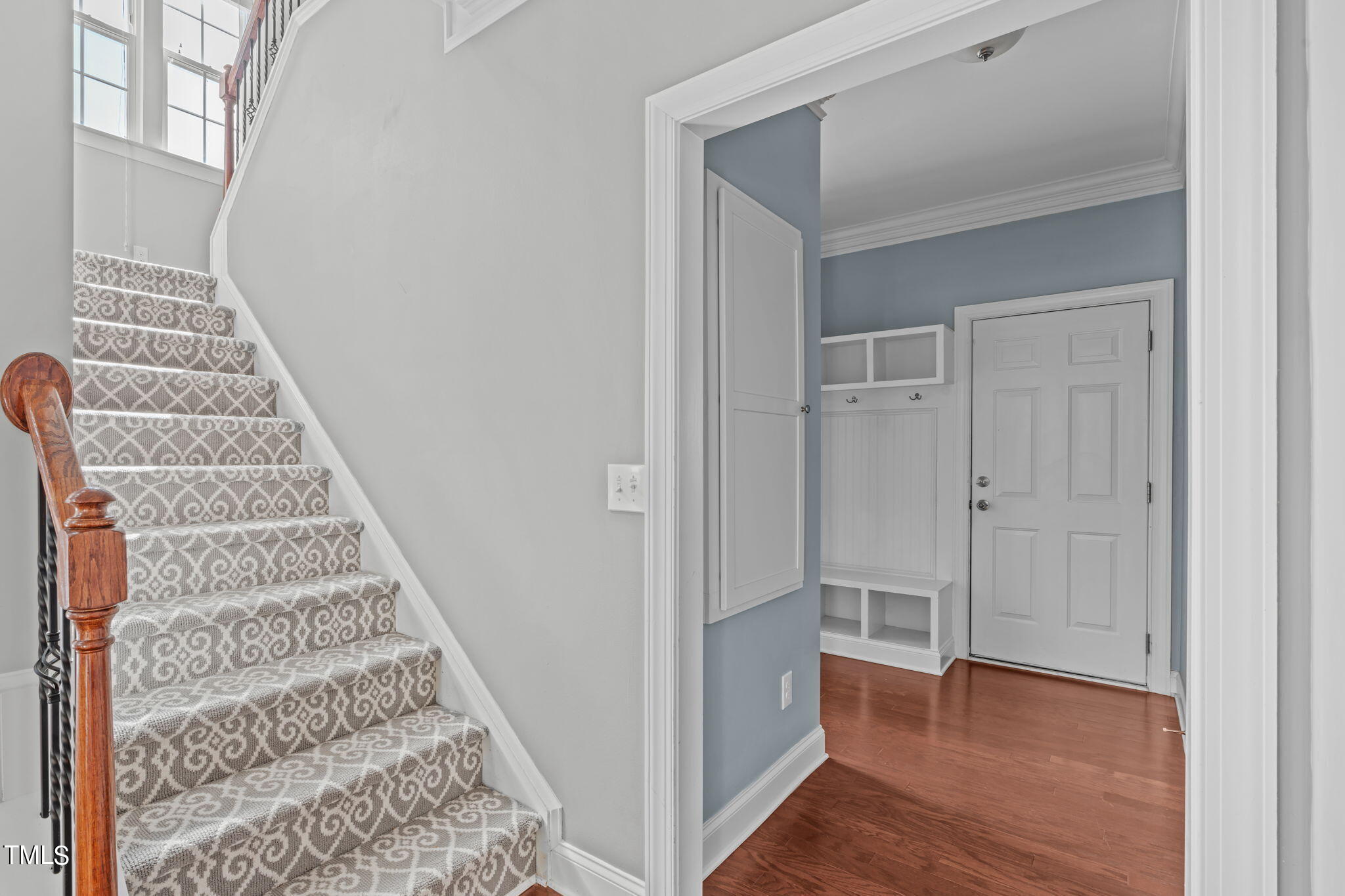 601 Democracy Street Raleigh, NC 27603 - Photo 11 of 24 a view of a hallway with wooden floor and entryway