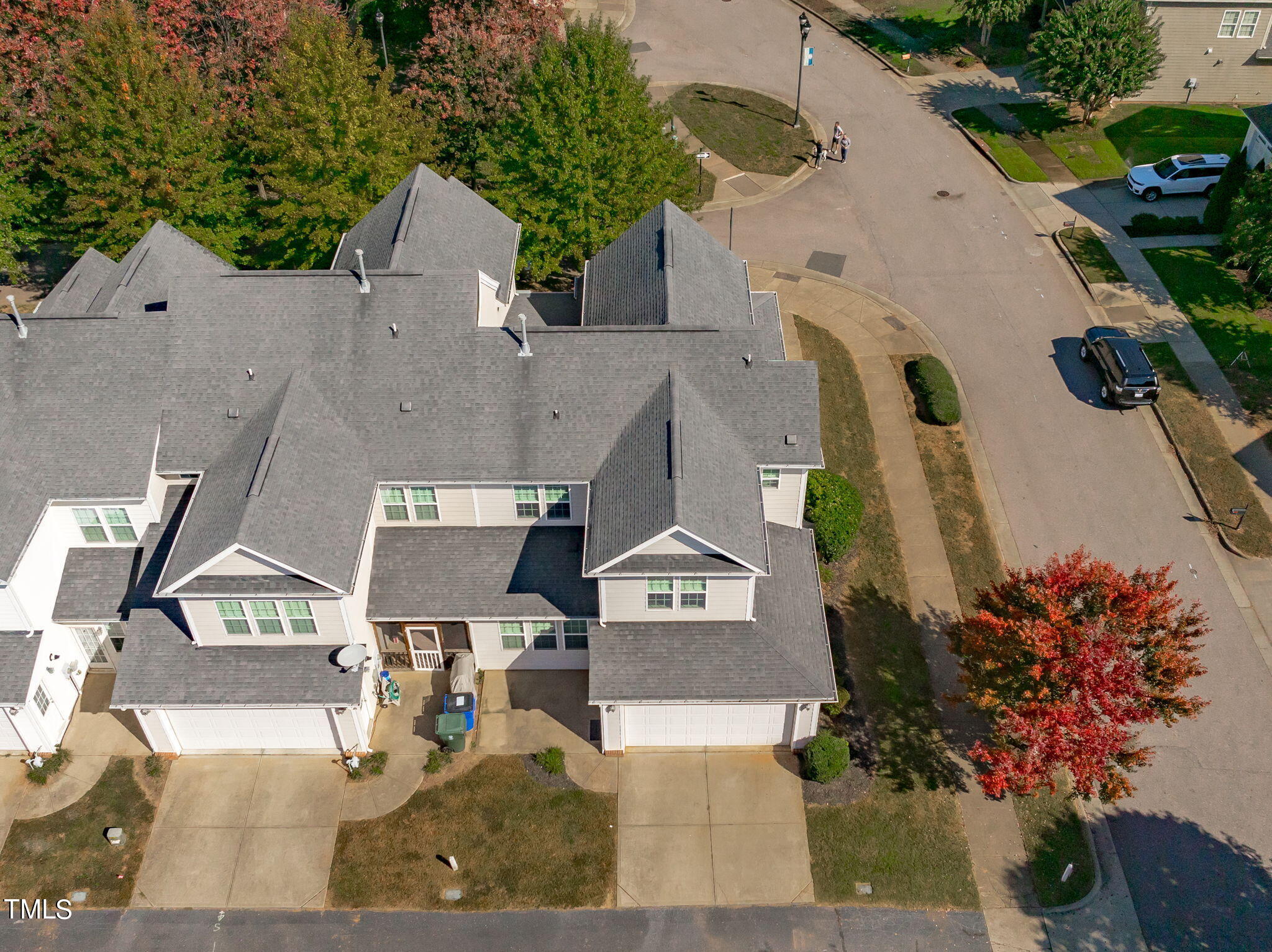 601 Democracy Street Raleigh, NC 27603 - Photo 21 of 24 an aerial view of a house with a yard and potted plants