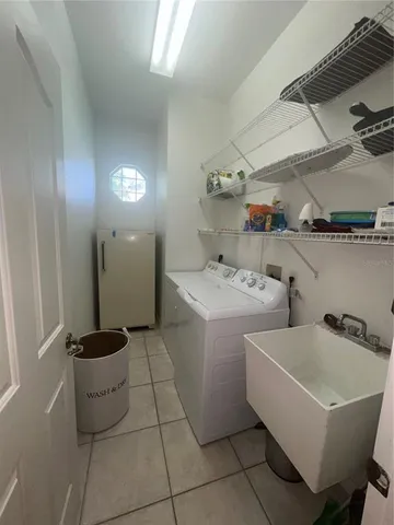 a bathroom with a sink and mirror