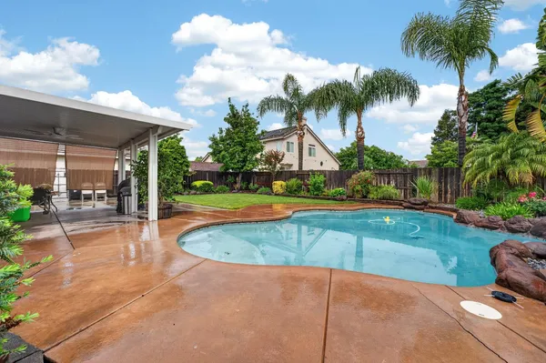 a view of outdoor space yard swimming pool and patio