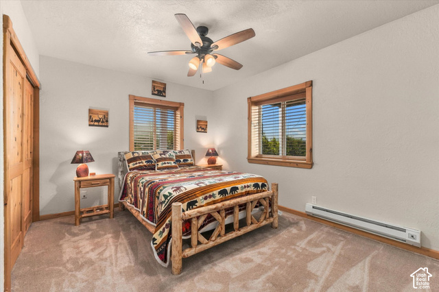 1701 Oak Road Coalville, UT 84017 - Photo 38 of 71 Wall-to-wall carpeting, wood-trimmed windows with blinds, and a ceiling fan with integrated lighting