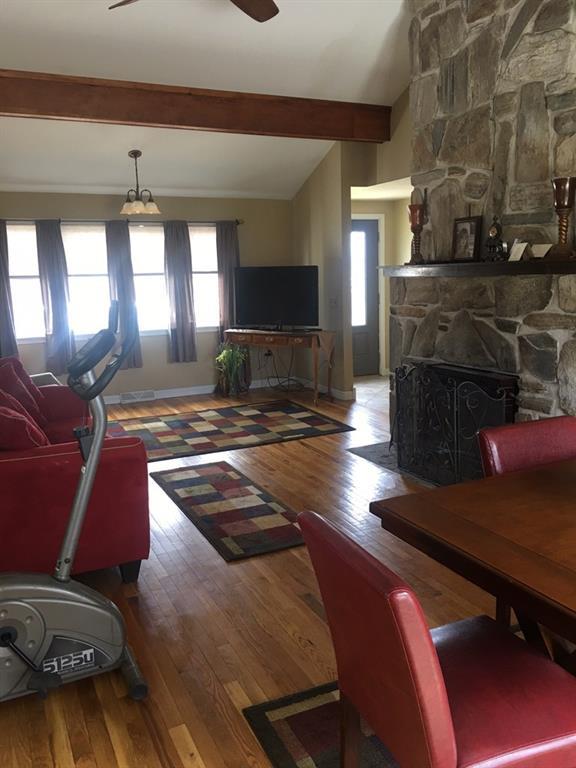 682 Village Road Smithfield, ME 04978 - Photo 9 of 29 Dining Looking At Fireplace