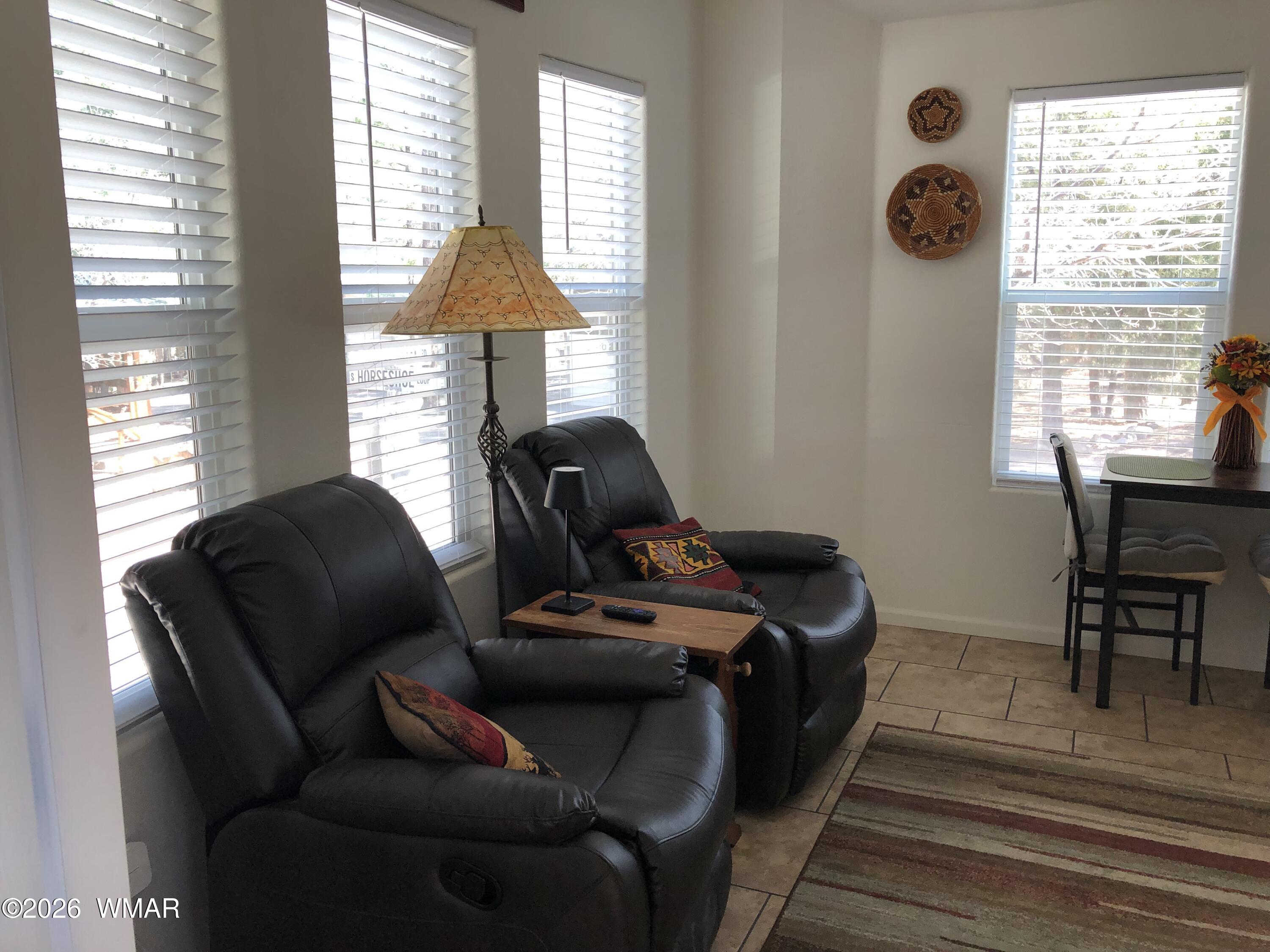 2301 Turtle Creek Road Show Low, AZ 85901 - Photo 11 of 35 a bedroom with a bed and a window