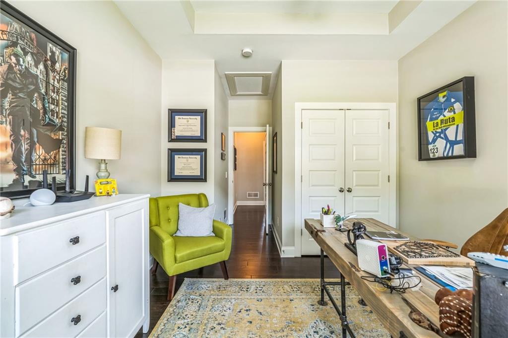 1621 Highland Creek Drive Monroe, GA 30656 - Photo 15 of 54 a living room with furniture and a wooden floor