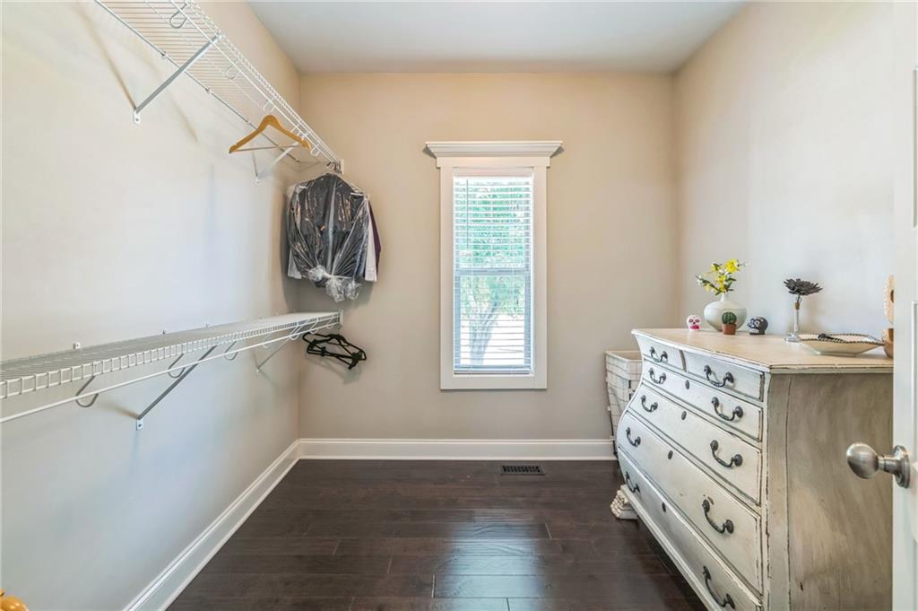 1621 Highland Creek Drive Monroe, GA 30656 - Photo 23 of 54 a bathroom with a sink a mirror and a window