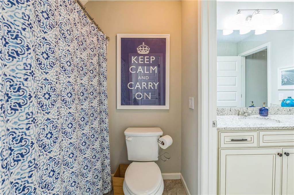1621 Highland Creek Drive Monroe, GA 30656 - Photo 32 of 54 a bathroom with a toilet and a sink