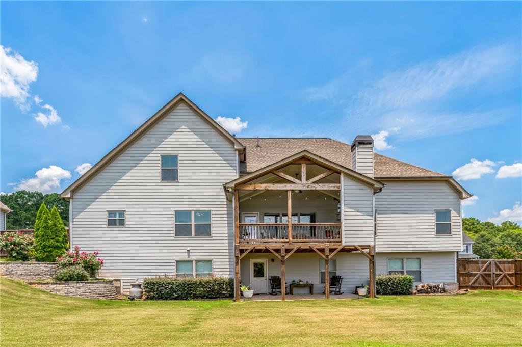 1621 Highland Creek Drive Monroe, GA 30656 - Photo 38 of 54 a front view of a house with a yard