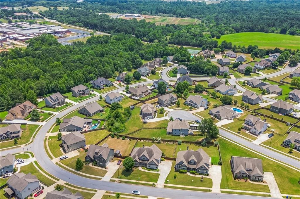 1621 Highland Creek Drive Monroe, GA 30656 - Photo 44 of 54 an aerial view of residential houses with outdoor space