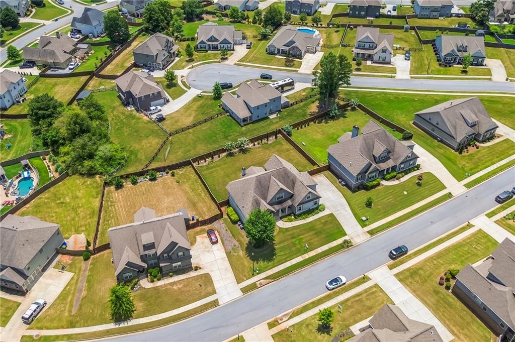 1621 Highland Creek Drive Monroe, GA 30656 - Photo 47 of 54 an aerial view of a house with a swimming pool