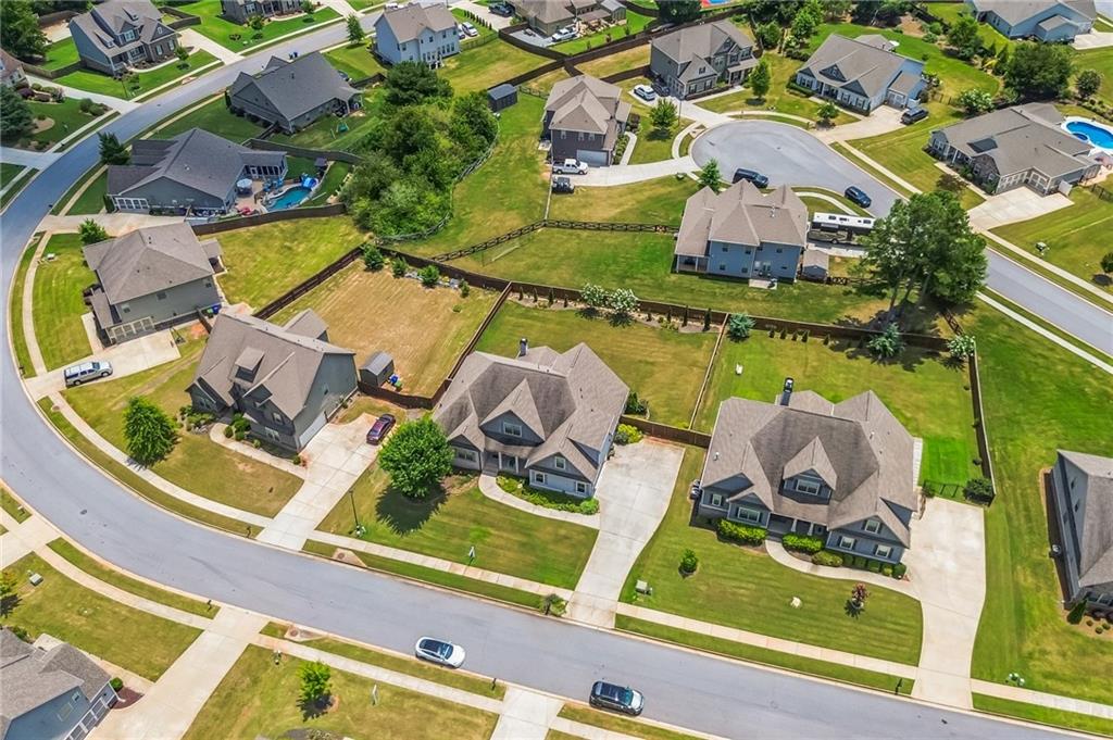 1621 Highland Creek Drive Monroe, GA 30656 - Photo 48 of 54 an aerial view of house with yard swimming pool and outdoor seating
