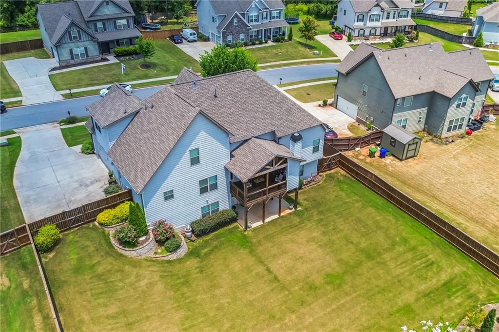 1621 Highland Creek Drive Monroe, GA 30656 - Photo 51 of 54 an aerial view of a house with swimming pool