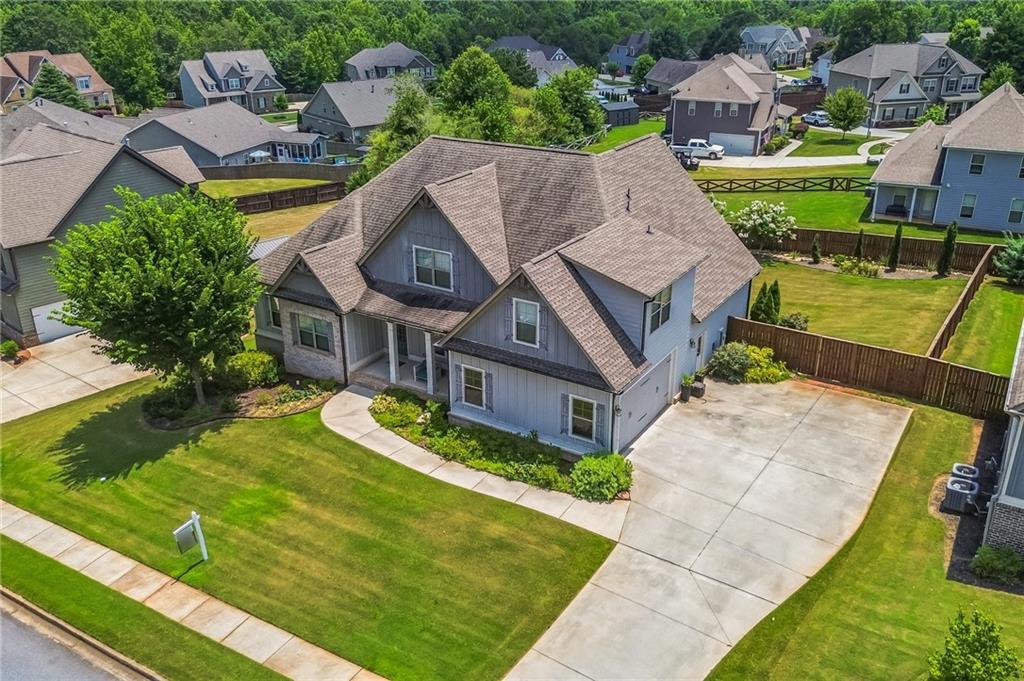 1621 Highland Creek Drive Monroe, GA 30656 - Photo 53 of 54 an aerial view of a house with swimming pool garden and patio