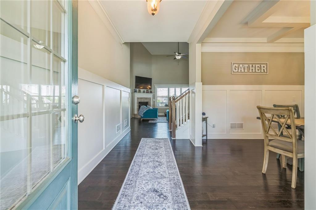1621 Highland Creek Drive Monroe, GA 30656 - Photo 6 of 54 a hallway with a wooden floor
