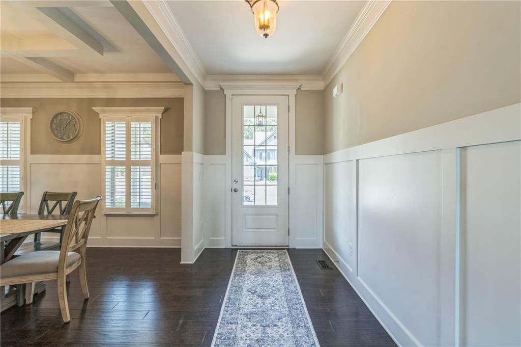 1621 Highland Creek Drive Monroe, GA 30656 - Photo 7 of 54 a view of hallway with furniture and wooden floor