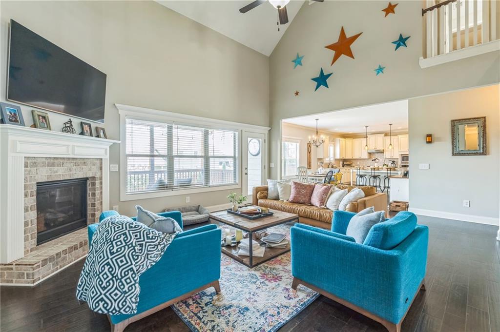 1621 Highland Creek Drive Monroe, GA 30656 - Photo 9 of 54 a living room with furniture and a flat screen tv