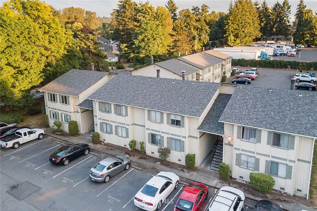 1601 Maple Lane, Unit A2 Kent, WA 98030 - Photo 1 of 27 a aerial view of a house with swimming pool and furniture