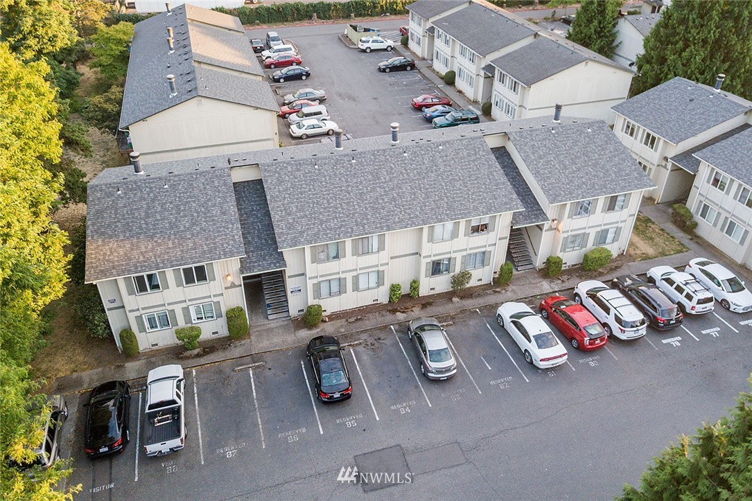 1601 Maple Lane, Unit A2 Kent, WA 98030 - Photo 2 of 27 an aerial view of residential houses with outdoor space
