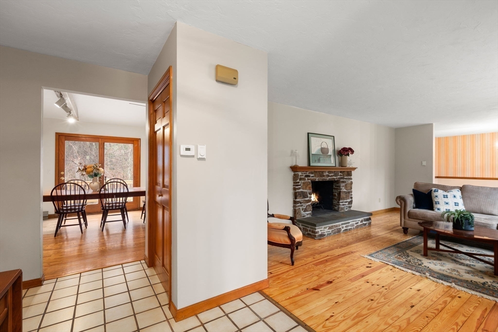 37 Finlay Road Sturbridge, MA 01518 - Photo 13 of 39 a living room with furniture and a fireplace