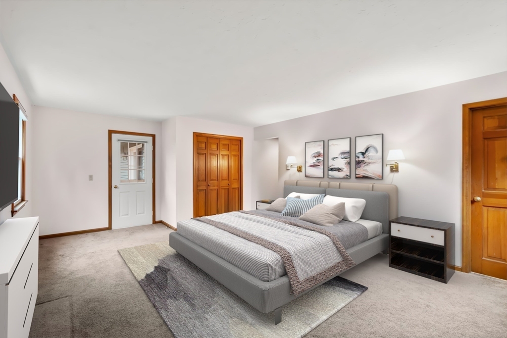 37 Finlay Road Sturbridge, MA 01518 - Photo 25 of 39 a bedroom with a large bed and a window