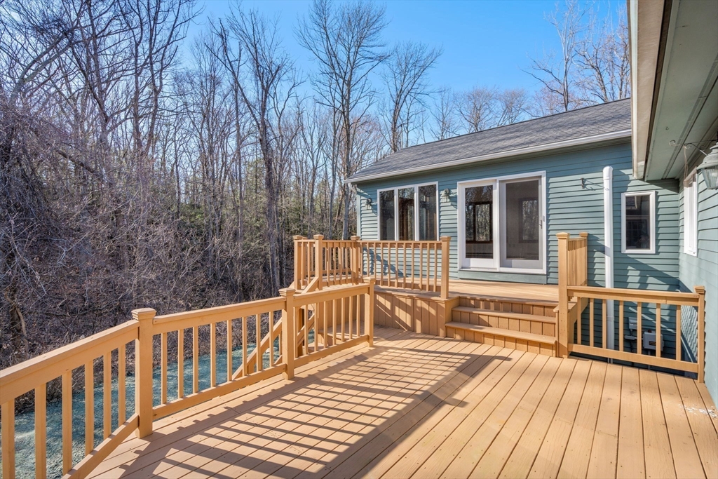 37 Finlay Road Sturbridge, MA 01518 - Photo 35 of 39 a view of a house with wooden deck