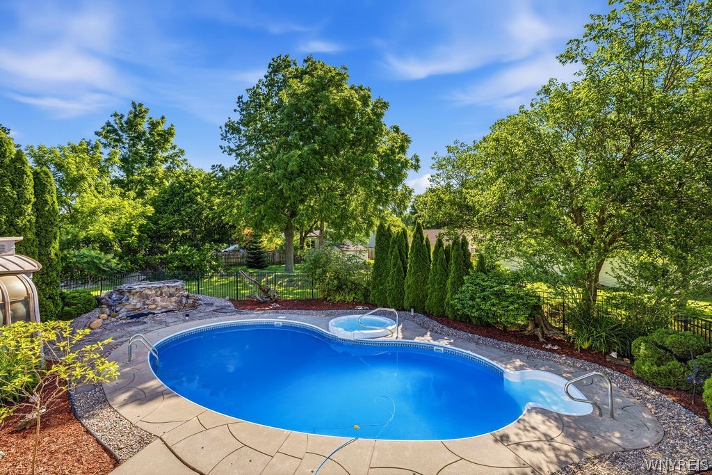 3089 Creek Road Porter, NY 14174 - Photo 2 of 33 Inground pool with a brand new liner, hot tub and rock wtaerfall