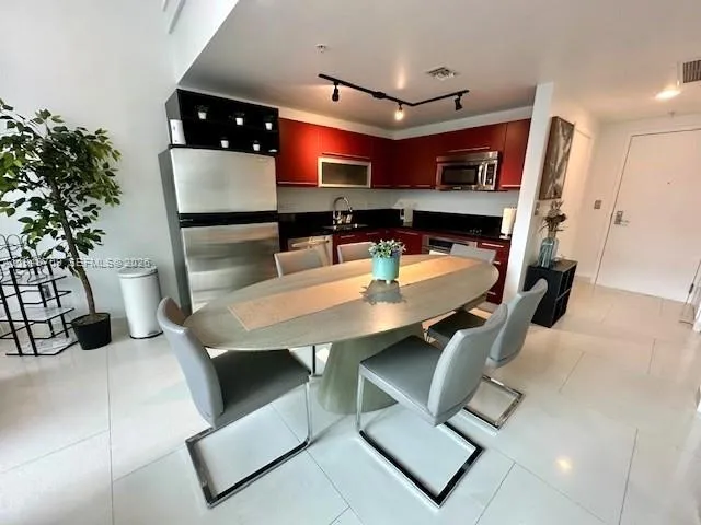 a dining room with furniture