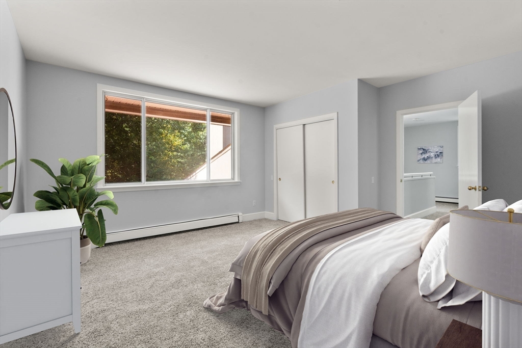 214 Allandale Road, Unit B Boston, MA 02467 - Photo 18 of 35 a bedroom with a bed and a potted plant