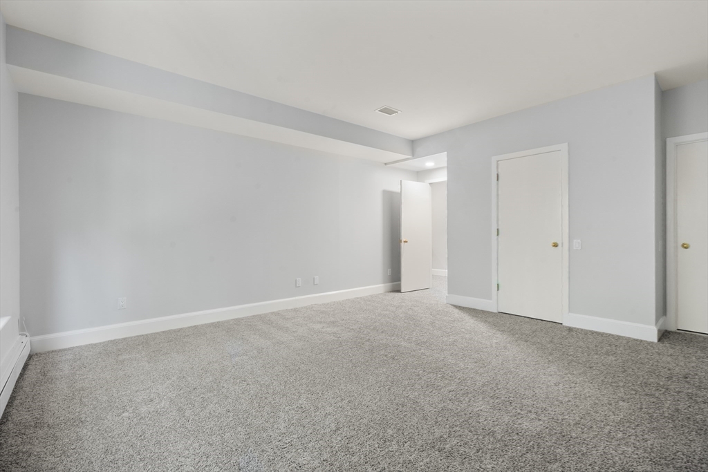 214 Allandale Road, Unit B Boston, MA 02467 - Photo 23 of 35 a view of an empty room