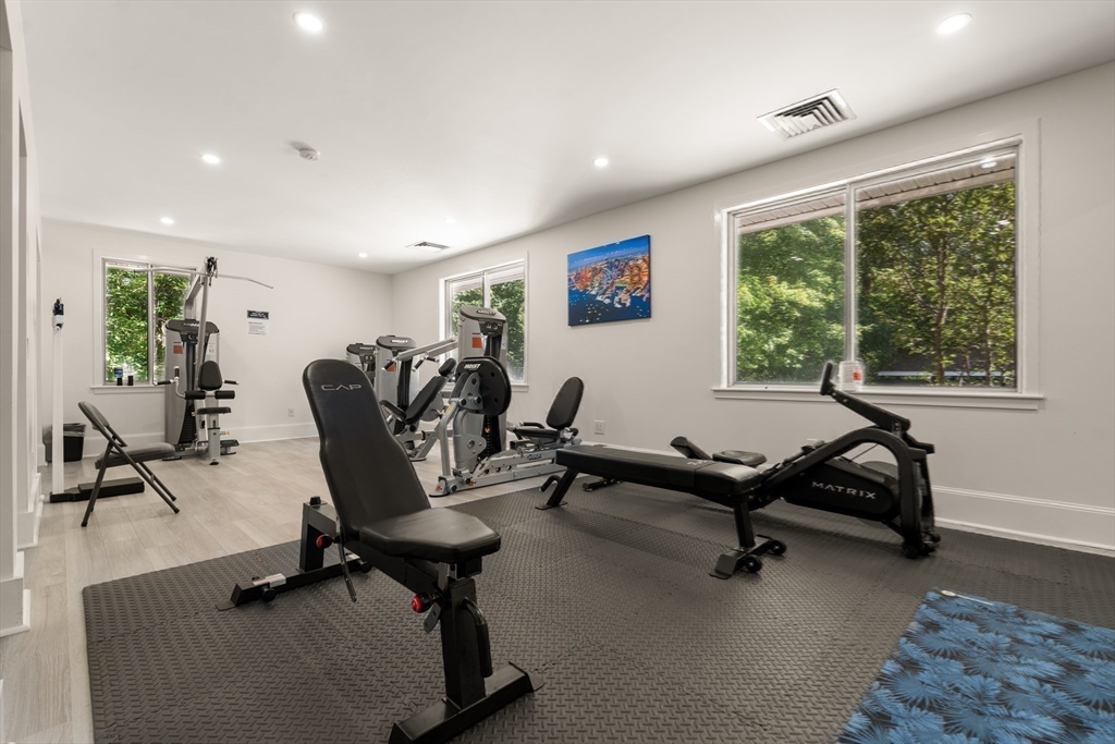 214 Allandale Road, Unit B Boston, MA 02467 - Photo 30 of 35 a view of a livingroom with workspace and a window