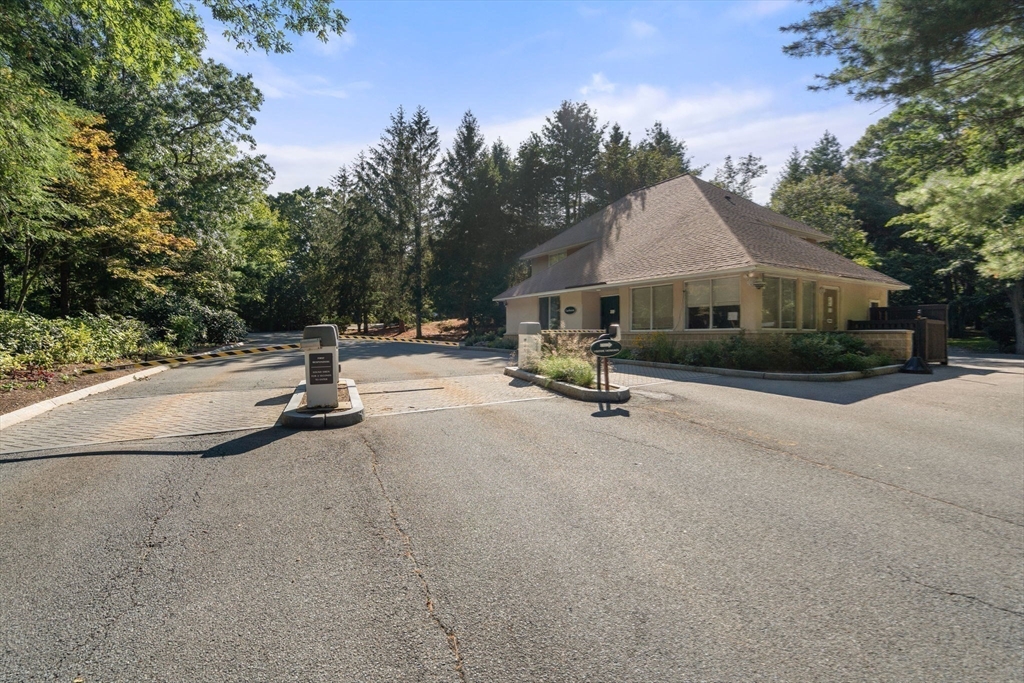 214 Allandale Road, Unit B Boston, MA 02467 - Photo 35 of 35 a car parked on the side of the road