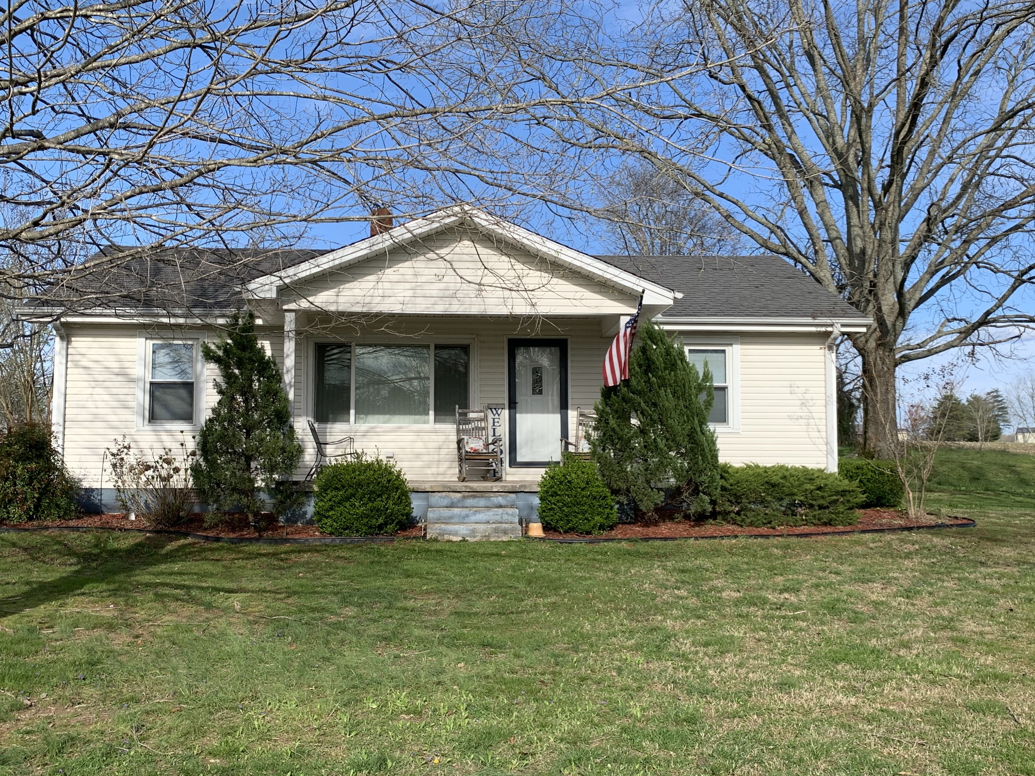 62 Asa Smith Road Ardmore, TN 38449 - Photo 4 of 24 a front view of a house with garden