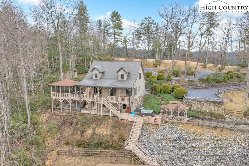 883 Wagon Ridge Road Ferguson, NC 28624 - Photo 2 of 50 front view of a house with a yard